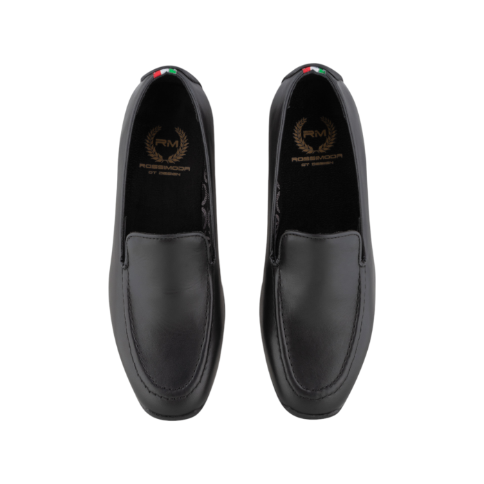 137 82B | The Rossimoda Slip On Leather in Black combines luxurious suede with a sleek, effortless design for ultimate comfort and style. Perfect for any occasion, these slip-ons offer a sophisticated touch to both casual and formal outfits.