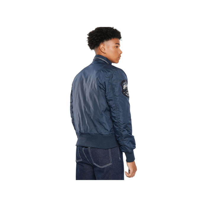 364 1A | The Alpha Engine Jacket in Rep Blue offers a perfect blend of durability and style, featuring a water-resistant outer shell and soft insulation. Ideal for any adventure, this jacket ensures you stay warm and dry while looking effortlessly chic.