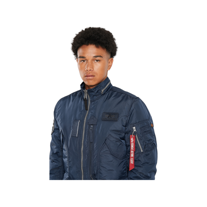 364 1B | The Alpha Engine Jacket in Rep Blue offers a perfect blend of durability and style, featuring a water-resistant outer shell and soft insulation. Ideal for any adventure, this jacket ensures you stay warm and dry while looking effortlessly chic.