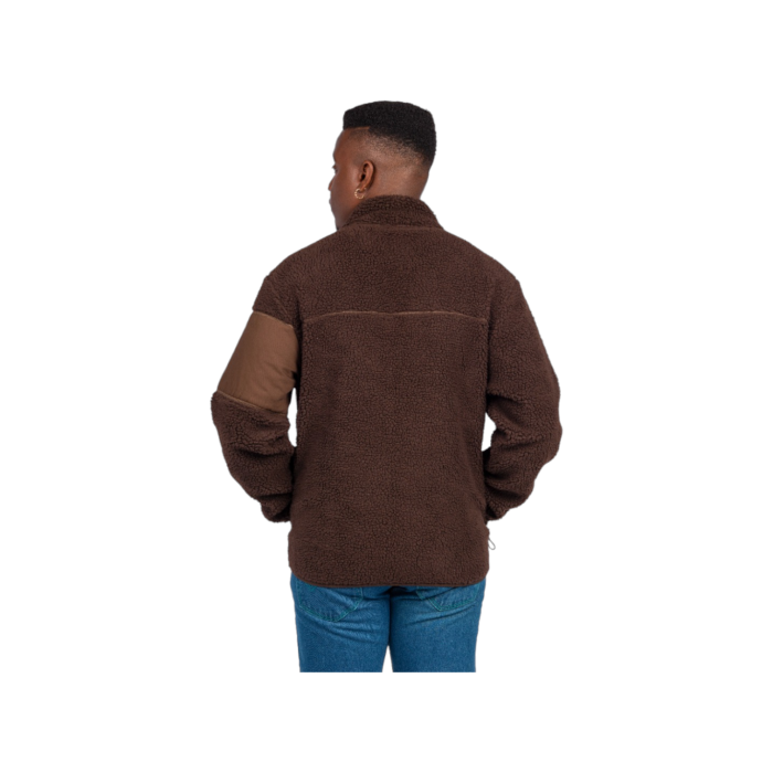 377 3A | The Dickies Seattle Chute Fleece LS Zip Thru in Brown Multi Colour blends warmth and style seamlessly. Crafted from a cozy cotton-polyester blend, it features a zip-through design, practical pockets, and elasticated cuffs for comfort and functionality in cooler weather. Ideal for layering or as a standalone jacket, it offers versatility and durability for everyday wear.