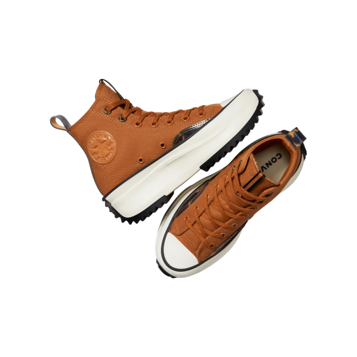 133 158C | The Converse Run Star Hike Hi in Tawny Owl brown and Black reimagines a timeless classic with bold, contemporary updates. With a striking brown upper, contrasting black details, and vibrant white accents, this high-top sneaker delivers a perfect blend of vintage charm and modern comfort.