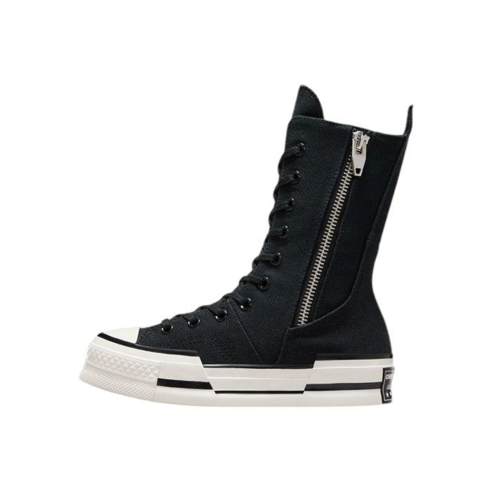 133 163A | Step up your sneaker game with the Converse Chuck 70 Plus X-Hi in sleek Black, featuring an extra-high silhouette that elevates the classic Chuck 70 design to new heights. With premium materials and enhanced cushioning, this bold shoe combines timeless style with modern comfort, making it perfect for any outfit or occasion.