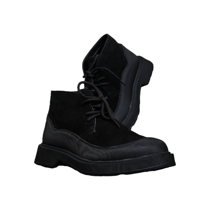 156 5B | The Cutty Dallas Suede Ankle Boots in Black offer a sleek, versatile design crafted from premium suede, providing both durability and style. Featuring a convenient slip on design, cushioned insole, and sturdy sole, these boots effortlessly combine comfort with sophistication for any occasion.