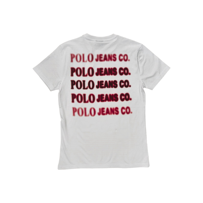 303 113A | The Polo Crew PJC Multi Logo T-Shirt in White offers a unique and stylish twist on a classic design, featuring a bold, eye-catching print that sets it apart from the ordinary. Made from high-quality materials, this t-shirt ensures comfort and durability, making it a perfect choice for any casual occasion.