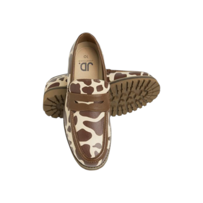 55 28B | Step into style with the Jonathan D Penny Moc PU Leather shoes in an eye-catching Cow Print Brown color combination. Crafted from high-quality PU leather, these shoes offer a sleek and sophisticated look, perfect for both casual and semi-formal occasions.