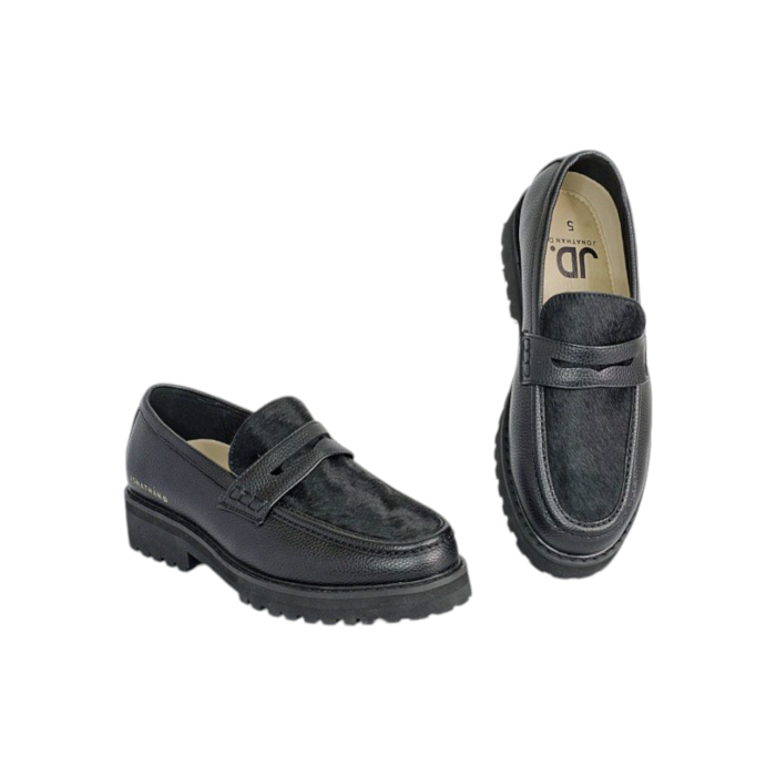 55 32A | Step into style with the Jonathan D Penny Moc PU Leather shoes in an eye-catching Pony Black color combination. Crafted from high-quality PU leather, these shoes offer a sleek and sophisticated look, perfect for both casual and semi-formal occasions.