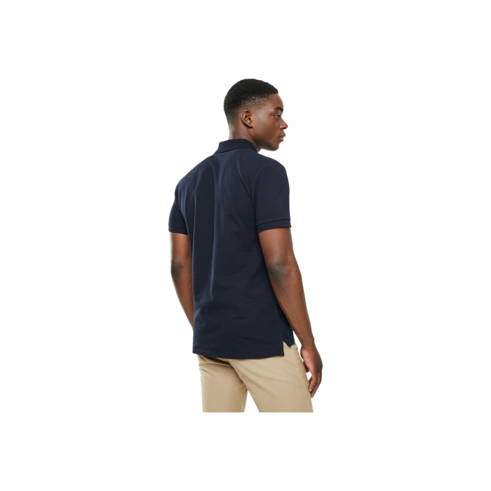 302 5C | The Polo Golfer Stretch Pique in Navy S/S combines classic design with a modern slim fit, making it a versatile addition to any wardrobe. Crafted from high-quality materials, this polo ensures both comfort and style for any occasion.