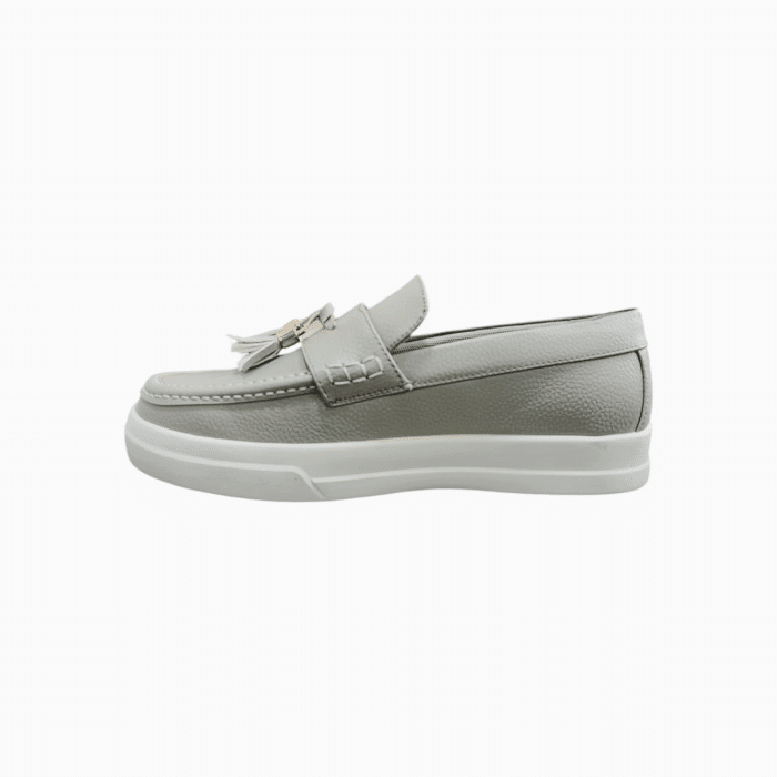 55 25A | The Jonathan D Tassel PU Leather shoes in Grey color effortlessly combine sophistication and modern style, making them a versatile addition to any wardrobe. Crafted from high-quality PU leather with a sleek tassel detail, these shoes offer a polished look that's perfect for both formal occasions and smart-casual outfits.