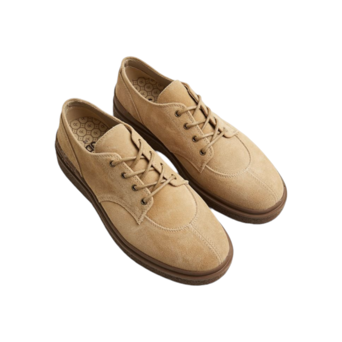 55 65B | The Jonathan D Ray Lace Up Sneaker Suede in Toast Tan color effortlessly combine sophistication and modern style, making them a versatile addition to any wardrobe. Crafted from high-quality Suede with a sleek detail, these shoes offer a polished look that's perfect for both formal occasions and smart-casual outfits.