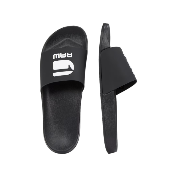 894 1B | Step into comfort and style with the G Star Cart III Basic Slides in a chic Black, featuring crisp white detailing on the top. Designed from durable 100% Thermoplastic Polyurethane, these slides offer both flexibility and resilience for everyday wear. Please note, these slides are not washable, ensuring their unique design and material stay intact over time.