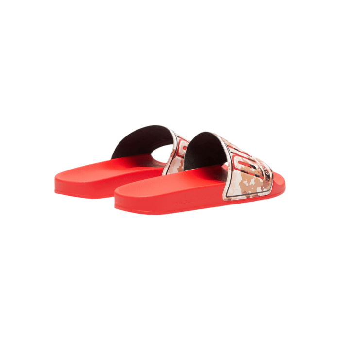 906 7B | The Diesel Mayemi Pool Slide combines sleek, modern style with a bold touch, featuring a classic red footbed and a patterned strap for a striking contrast. Ideal for casual wear, these slides offer both comfort and durability, perfect for poolside lounging or everyday adventures.