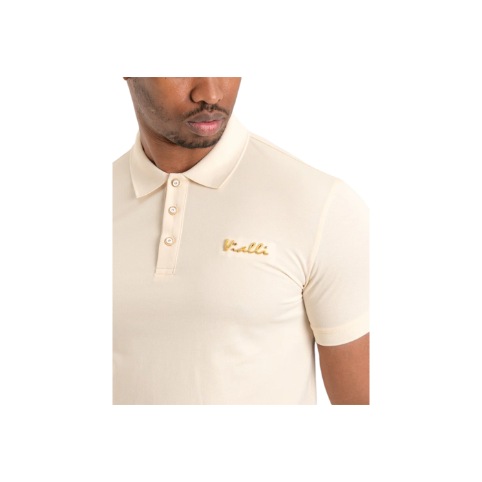 941 19B | The Vialli Golfer Ichino in Cream S/S combines classic design with a modern slim fit, making it a versatile addition to any wardrobe. Crafted from high-quality materials, this polo ensures both comfort and style for any occasion.