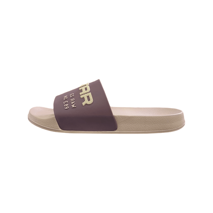 961 4A | Step into comfort and style with the G Star Cart V TPU Slides in a chic Pink, featuring crisp dark pink detailing on the top. Designed from durable 100% Thermoplastic Polyurethane, these slides offer both flexibility and resilience for everyday wear. Please note, these slides are not washable, ensuring their unique design and material stay intact over time.