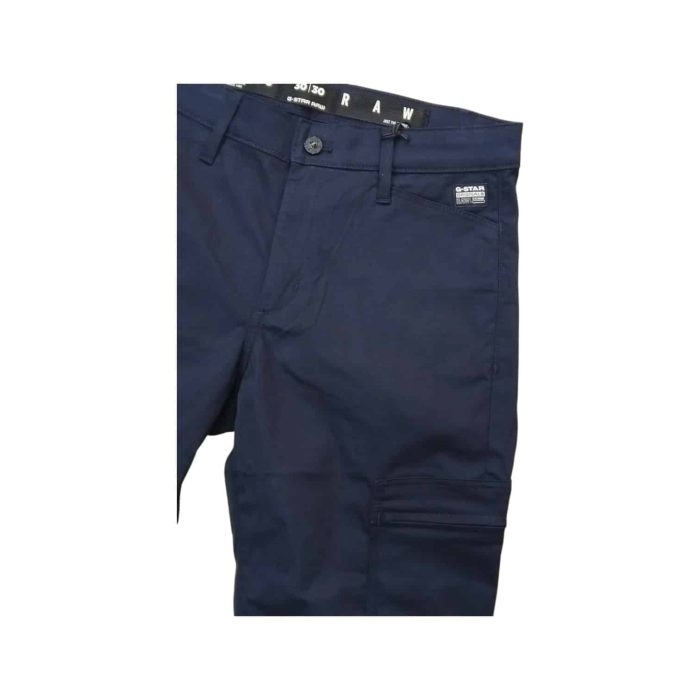 1020 3B | The G-Star Skinny Chino Cargo 2.0 in Osaka Blue seamlessly blends modern style with practical functionality, featuring a sleek, skinny fit that flatters the silhouette while incorporating stylish cargo pockets for added utility. Made from a premium cotton blend with a hint of elastane, these chinos offer exceptional comfort and flexibility, ensuring you can move freely throughout your day without sacrificing style. With its rich Osaka Blue color and versatile design, this pair of chinos easily transitions from casual outings to more polished events, making it a must-have staple for any contemporary wardrobe.