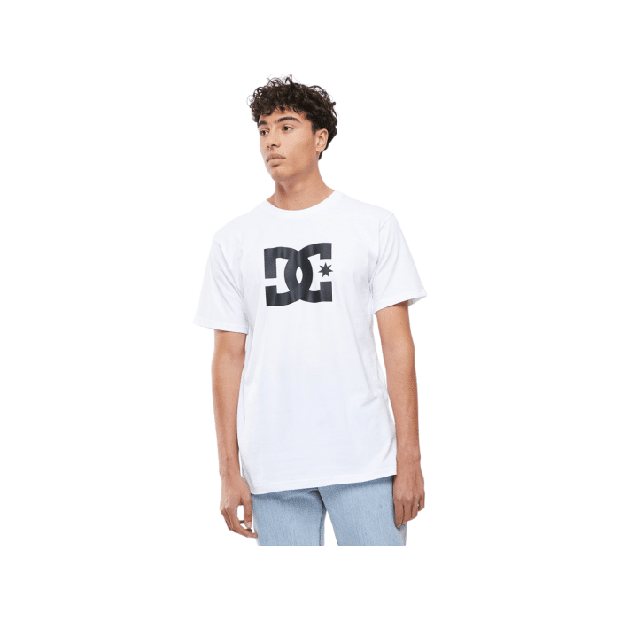 1090 2A | The DC Shoes T Shirt Star Logo Short Sleeve in White-Black blends comfort and style effortlessly, featuring a bold black DC star logo against a crisp white background for a sharp, urban look. Made from 100% premium cotton, this tee provides a soft, breathable feel perfect for all-day wear and versatile layering across seasons. Its relaxed fit and classic crew neck design make it easy to pair with jeans, shorts, or jackets, making it an essential piece for anyone who values durable, skate-inspired fashion with a modern edge.