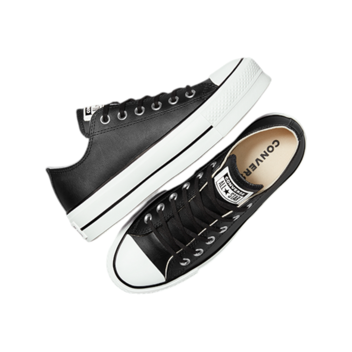 125 23C | Elevate your style with the Converse Chuck Taylor AS Lift Leather Platform Low in Black, featuring a bold platform sole that adds a modern twist to the classic silhouette. The crisp white sole provides a striking contrast to the rich black upper, making these sneakers a must-have for any fashion-forward wardrobe.