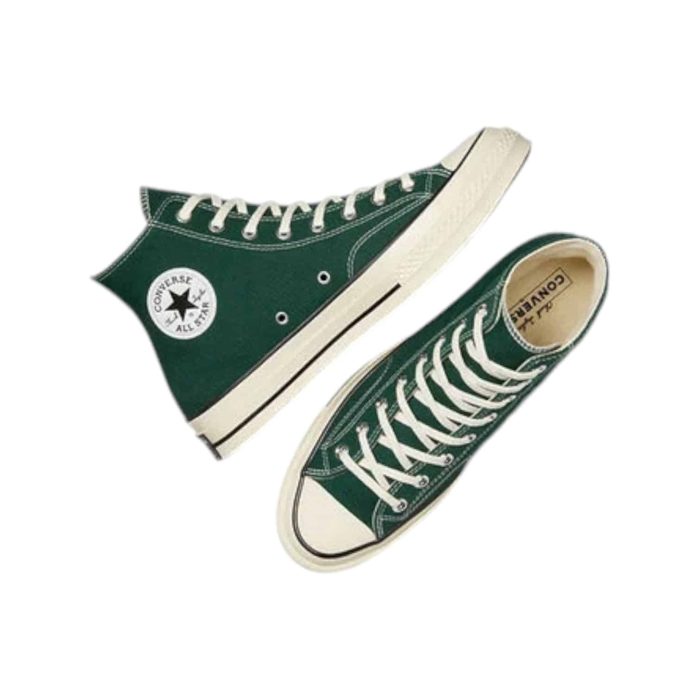 130 110B | The Converse Chuck 70 Hi Green/Black blends vintage charm with modern updates, featuring a bold green canvas upper contrasted by sleek black accents for a standout look. Crafted from premium materials, it offers enhanced comfort with a cushioned OrthoLite insole and a thicker rubber sole for better support and durability. This high-top sneaker not only makes a style statement but also provides superior performance, making it perfect for everyday wear and versatile enough to pair with any outfit.