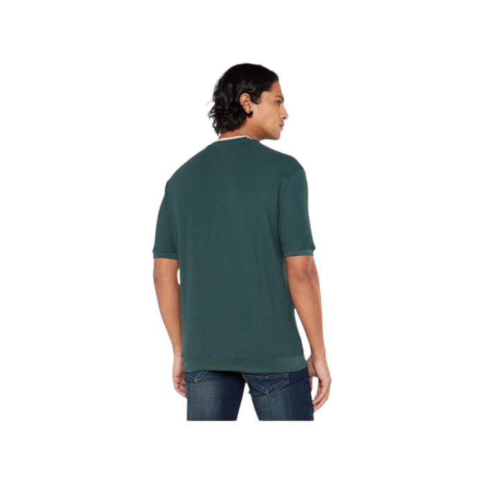 47 15A | The Jonathan D T-Shirt Saint in Olive offers a sleek, minimalist design crafted from soft, breathable cotton, providing both comfort and durability for everyday wear. Its versatile Olive hue and classic fit make it a perfect choice for effortless style, whether dressed up or down.