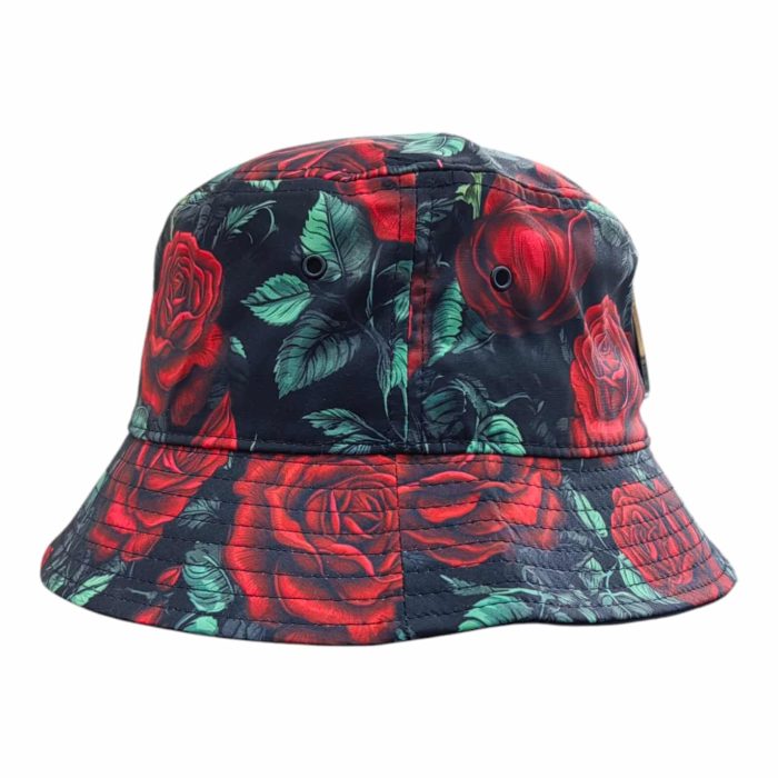 479 55 C | The Rossimoda Bucket Hat Rose Garden is a stylish and versatile accessory that features a vibrant floral print, showcasing delicate roses in rich colors that add a touch of elegance to any outfit. Crafted from high-quality, breathable materials, this hat not only offers comfort but also provides ample sun protection with its wide brim, making it perfect for outdoor activities and sunny days. With its adjustable inner band for a secure fit and packable design, the Rose Garden Bucket Hat effortlessly combines practicality and chic style, allowing you to express your individuality while enjoying both comfort and flair.