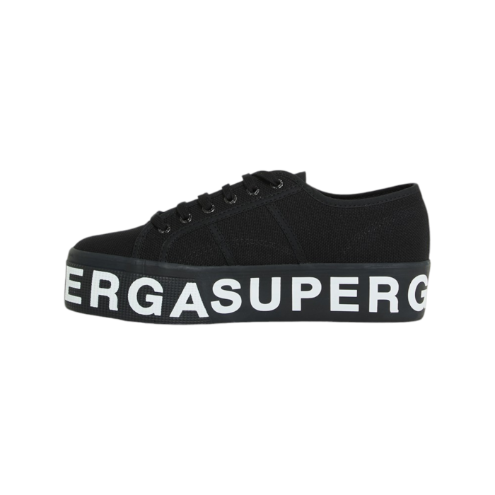 556 2A | Step up your sneaker game with the Superga 2790 Platform Lettering in a sleek back canvas, featuring bold white lettering on the sole for a striking contrast. The elevated platform design not only adds height but also delivers a chic, modern edge that pairs effortlessly with any casual outfit.