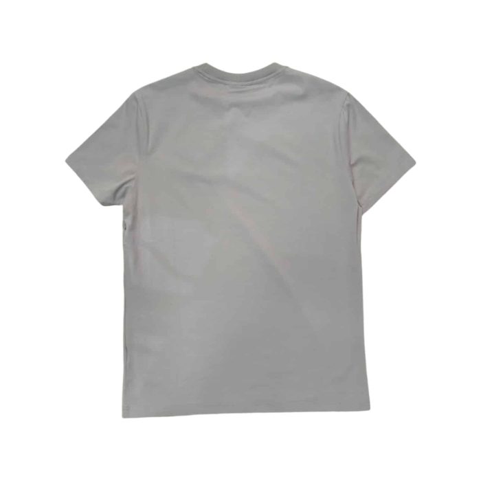 559 128 B | The Enrico Coveri T-Shirt Small Chest Logo in Grey is a stylish and versatile piece that effortlessly enhances your casual wardrobe, showcasing a timeless grey hue that pairs seamlessly with various outfits. Crafted from high-quality cotton, this t-shirt offers a soft and breathable fit, ensuring all-day comfort whether you’re lounging at home or out with friends. The small chest logo adds a subtle yet sophisticated touch, reflecting Enrico Coveri's attention to detail and commitment to quality, making this t-shirt an essential choice for those who appreciate both style and comfort in their everyday attire.