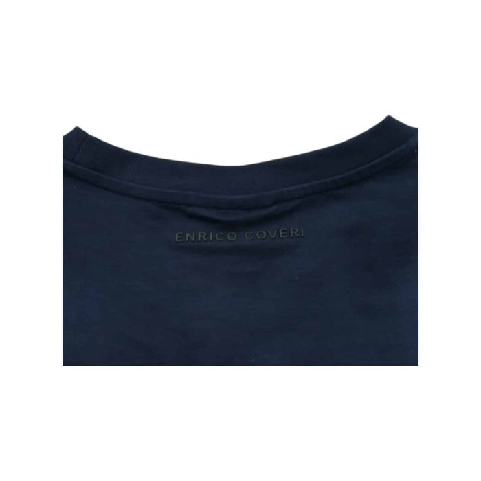 559 78 C | The Enrico Coveri T-Shirt 3D Stud Print in Navy is a stylish and modern addition to your wardrobe, featuring a rich navy hue that offers versatility and sophistication for various occasions. Crafted from premium-quality cotton, this t-shirt combines comfort and breathability with a unique 3D stud print design that adds a dynamic texture and visual interest, transforming a classic piece into a standout statement. With its timeless crew neck and relaxed fit, this t-shirt not only ensures ease of movement but also effortlessly enhances your casual or semi-formal outfits, making it a must-have for those who appreciate both style and comfort.