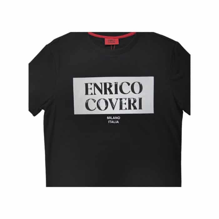 559 97 M | The Enrico Coveri Crew 3D Print Logo T-Shirt in Black/White effortlessly combines modern style with exceptional comfort, featuring a bold white 3D logo that stands out strikingly against the classic black fabric. Crafted from a soft and breathable cotton blend, this t-shirt offers a relaxed fit that ensures all-day comfort, making it perfect for a variety of occasions, whether you’re hanging out with friends or enjoying a casual day out. Versatile and easy to style, it pairs seamlessly with jeans or shorts, making it an essential addition to your wardrobe that allows you to express your unique personality while maintaining a chic, effortless look