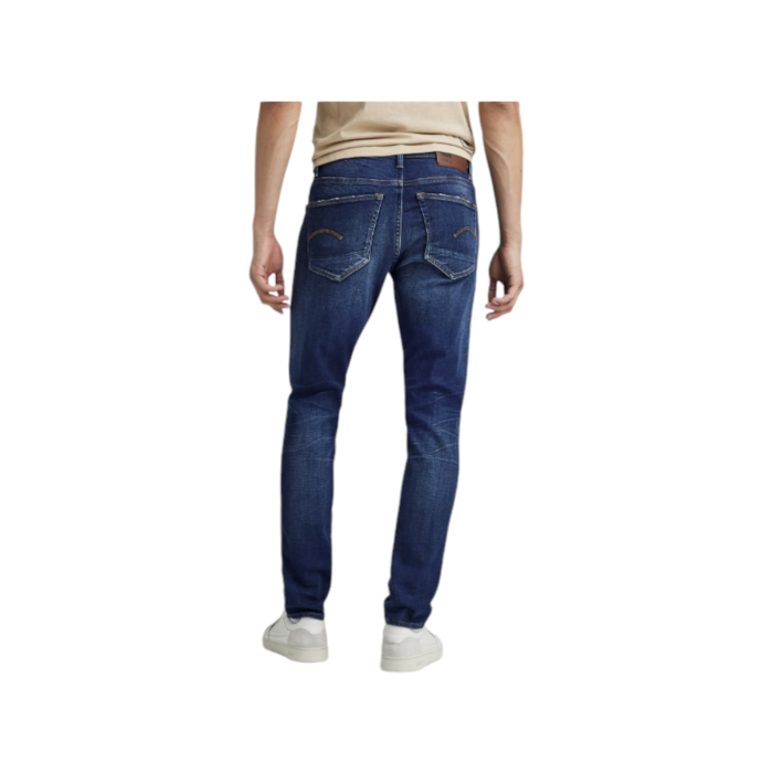 808 1B | The G Star Jeans 3301 Slim Fit in Worker Blue Faded Colour offers a classic denim look with a modern slim fit, perfect for any occasion. Its high-quality fabric and expert craftsmanship ensure durability and comfort, making these jeans a versatile and stylish addition to your wardrobe.