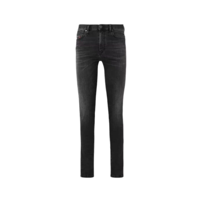 866 3 B | The <em>Diesel Jeans Skinny D-Istort-X Faded Black</em> features a sleek, body-hugging fit that tapers from the waist to the ankle, offering a modern silhouette while ensuring flexibility and comfort through its high-quality stretch denim. The faded black wash adds a rebellious, worn-in look that effortlessly transitions from casual daytime outfits to edgy evening ensembles, pairing well with a variety of tops and accessories for versatile styling. Thoughtfully designed with details such as reinforced stitching, branded metal hardware, and Diesel’s iconic logo patch on the back waistband, these jeans combine durability and fashion-forward style for everyday wear.