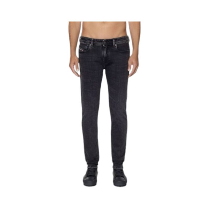 866 6 B | The <em>Diesel Jeans Skinny 1979 Sleenker Washed Black</em> offers a modern, body-hugging fit that tapers from the hips to the ankles, creating a sleek silhouette that is both flattering and versatile for various outfits. Crafted from premium stretch denim, these jeans provide all-day comfort and ease of movement, while the washed black finish gives them a subtly distressed, worn-in look, adding an edgy yet refined touch to your wardrobe. Thoughtfully designed with details such as reinforced stitching, branded metal hardware, and Diesel’s iconic logo patch on the back waistband, these jeans combine style, durability, and practicality for any occasion.