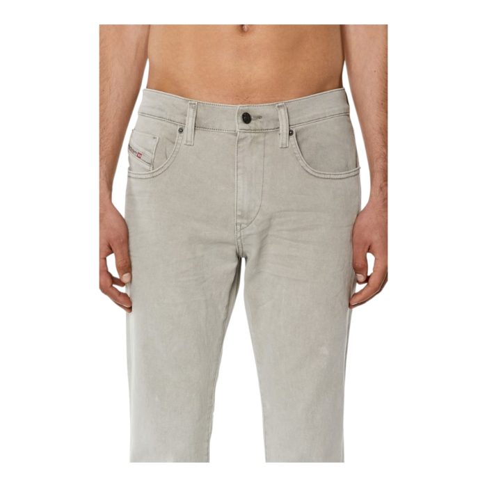 867 9 B | The <strong>Diesel 2019 D-Strukt Light Grey Jeans</strong> combine a sleek, slim-fit silhouette with Diesel’s signature light grey wash, bringing a modern, versatile edge to your wardrobe. Crafted from durable, high-quality denim, these jeans offer subtle fading and distressed details for a worn-in yet polished look that adapts effortlessly from casual outings to more refined occasions. Designed for both comfort and style, they feature classic five-pocket styling, reinforced stitching, and Diesel's iconic branding, making them a standout choice for everyday wear with a hint of urban sophistication.