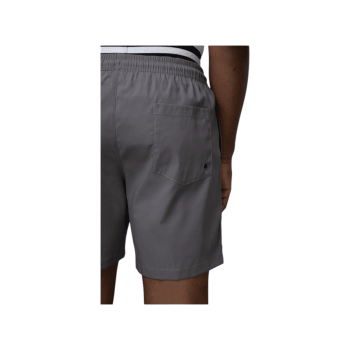 918 10C | The Polo Sports Monogram Beach Shorts in Grey offer a sleek and understated design with a plain pink exterior, featuring a subtle Polo logo on the left bottom side. However, when wet, these innovative shorts reveal a hidden darker grey monogram pattern across the fabric, transforming their look into something dynamic and eye-catching. Perfect for beach days, these stylish and functional shorts blend simplicity with a surprising twist, making them an ideal choice for those who love a mix of classic and modern fashion elements.