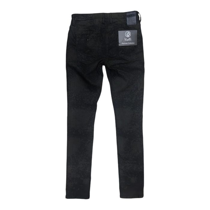 939 12 B | The Vialli Chesnachios Scheletrico Skinny Jeans in Oil Black offer a bold, contemporary look with their sleek, edgy finish and form-fitting silhouette. Crafted from premium materials, these jeans feature intricate detailing that enhances their stylishly distressed appearance, making them a standout choice for any modern wardrobe. Perfect for day-to-night wear, the Chesnachios jeans deliver both comfort and statement-worthy design, ideal for those who seek a refined yet rugged aesthetic.