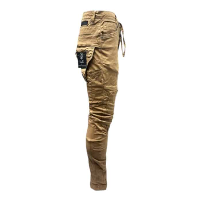 939 27 D 1 | Vialli Ranger Cargo Pants in a versatile Khaki colour, designed for both functionality and style. Crafted from durable fabric, these cargo pants feature multiple pockets, providing ample storage for all your essentials while maintaining a sleek silhouette. The adjustable waistband ensures a comfortable fit, making them perfect for outdoor adventures or casual outings, effortlessly blending practicality with contemporary fashion