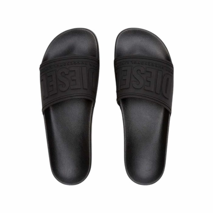 Diesel Black Sandal 1 1 | The <em>Diesel SA-Mayemi CC 3D Logo Sandal Black</em> combines contemporary style with exceptional comfort, featuring a sleek black design highlighted by a bold 3D logo that adds a touch of modern flair. Crafted from high-quality materials, these sandals offer a soft, cushioned footbed for all-day wear, ensuring your feet stay comfortable whether you're lounging by the pool or exploring the city. With their adjustable strap for a customized fit and durable sole for reliable traction, these sandals effortlessly blend fashion and functionality, making them an essential addition to your warm-weather wardrobe.