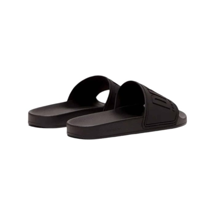 Diesel Black Sandal 3 | The <em>Diesel SA-Mayemi CC 3D Logo Sandal Black</em> combines contemporary style with exceptional comfort, featuring a sleek black design highlighted by a bold 3D logo that adds a touch of modern flair. Crafted from high-quality materials, these sandals offer a soft, cushioned footbed for all-day wear, ensuring your feet stay comfortable whether you're lounging by the pool or exploring the city. With their adjustable strap for a customized fit and durable sole for reliable traction, these sandals effortlessly blend fashion and functionality, making them an essential addition to your warm-weather wardrobe.