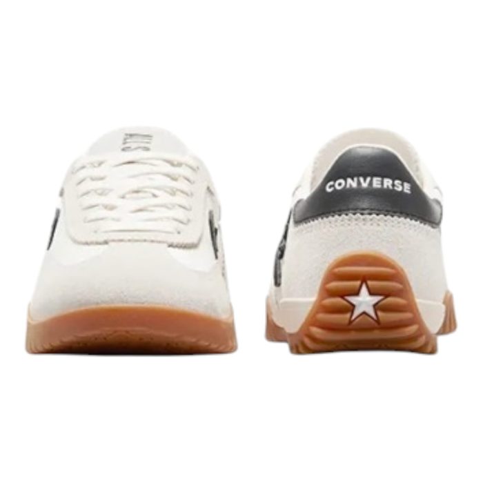 125 41 D | The Converse Run Star Trainer in Egret/Honey brings a bold twist to the classic Converse silhouette, featuring a chunky platform sole and split-tooth outsole for a modern, edgy look with enhanced traction. The soft, neutral tones of Eggret and Honey create a sophisticated yet versatile colorway that pairs effortlessly with a range of styles, from casual to elevated. With a durable canvas upper and cushioned insole, these trainers offer lasting comfort and support, making them perfect for all-day wear