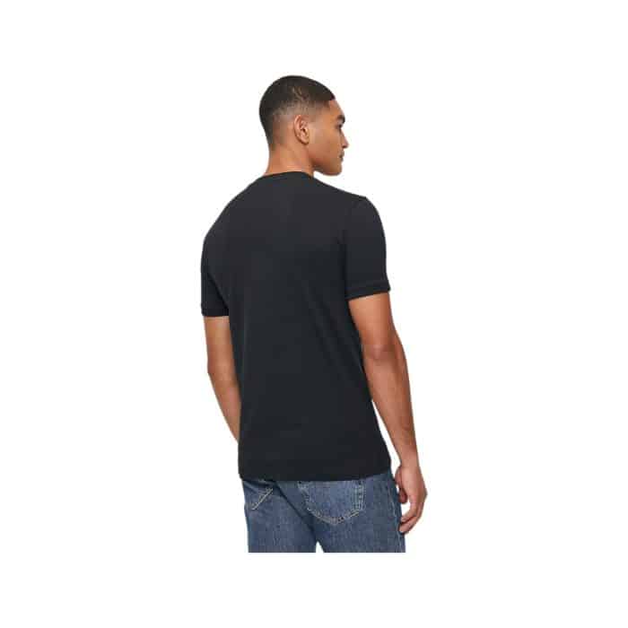 303 126 B | The Polo T-Shirt PJC Cuffed SS Black offers a refined, modern take on the classic polo, featuring cuffed sleeves for a stylish, tailored look. Crafted from soft, breathable cotton, this shirt ensures comfort while maintaining a sleek, versatile appearance that can easily transition from casual to smart-casual occasions. With its minimalistic black design and thoughtful details, including a classic polo collar and button placket, this polo is a wardrobe essential that combines timeless elegance with everyday practicality.