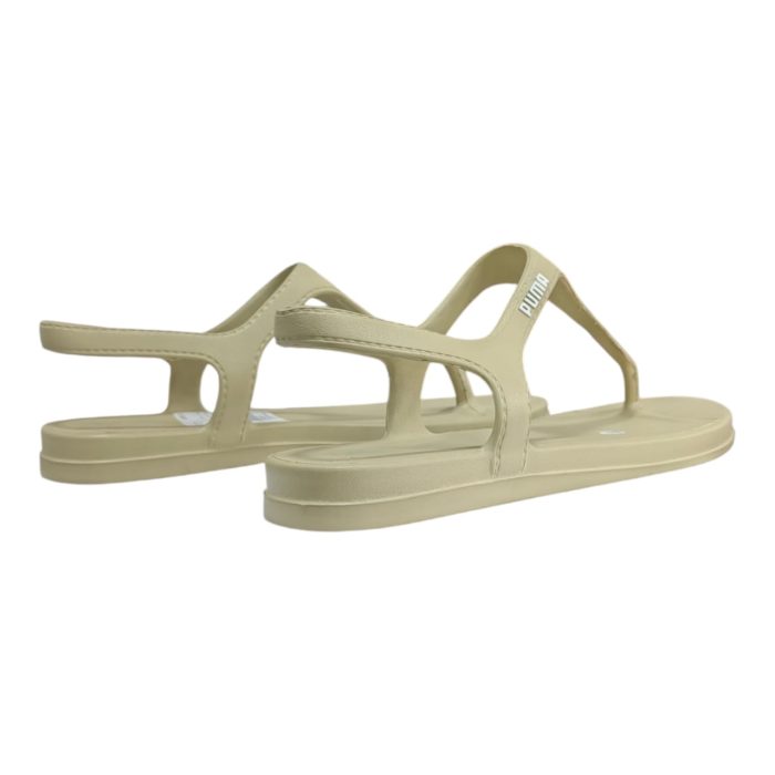 528 26 B | The Puma Sandals StyleCat Sleek Injex in Sand Dune offer a stylish, minimalist design with a slip-on fit that ensures both comfort and convenience, making them perfect for everyday wear. Crafted with a soft, flexible upper and a cushioned footbed, these sandals provide long-lasting support and comfort while the flexible rubber outsole delivers reliable traction on various surfaces. The neutral Sand Dune colorway makes them incredibly versatile, easily complementing a wide range of casual outfits, from beachwear to laid-back summer looks.