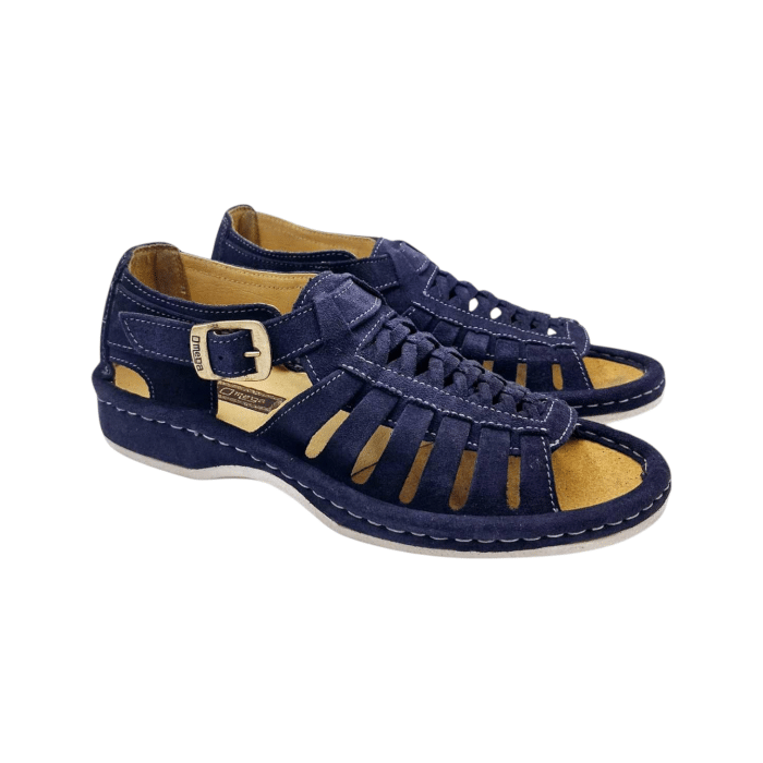 688 28B | The Omega Sandals Kgosi Midrid Suede Navy are crafted from luxurious, high-quality navy suede, offering a refined yet versatile style that pairs seamlessly with both casual and dressier summer outfits. Designed for lasting comfort, they feature a cushioned, ergonomic footbed that supports your arches and a lightweight, flexible outsole for reliable traction on various surfaces. With their soft, padded straps and premium suede finish, these sandals provide both all-day comfort and an effortlessly sophisticated look perfect for any warm-weather occasion.