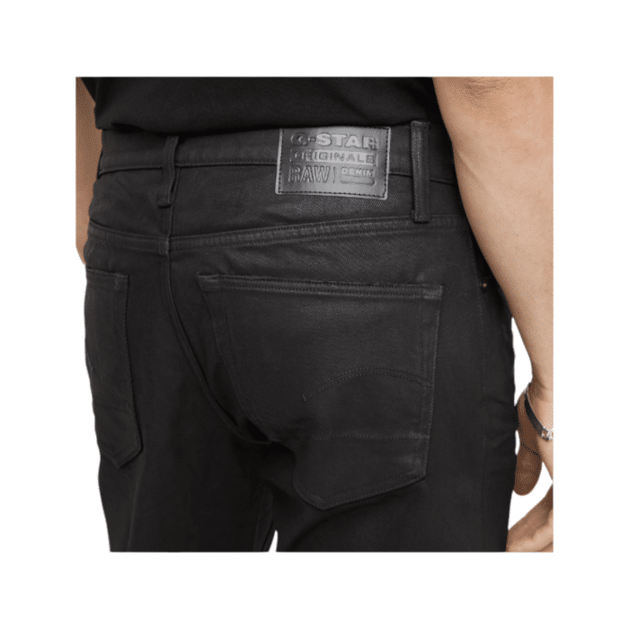 808 29C | The G Star Jeans 3301 Slim Fit in Dark Aged Wax Black Colour offers a classic denim look with a modern slim fit, perfect for any occasion. Its high-quality fabric and expert craftsmanship ensure durability and comfort, making these jeans a versatile and stylish addition to your wardrobe.