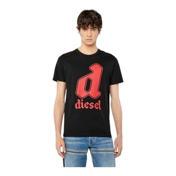 862 42 B | The Diesel T-Shirt T-Diegor K54 Black combines minimalist design with bold branding, making it a versatile staple for any wardrobe. Crafted from 100% premium cotton, it offers a soft, breathable feel and a regular fit that ensures all-day comfort while maintaining a sleek silhouette. Featuring Diesel’s iconic logo prominently on the chest, this timeless black T-shirt effortlessly transitions from casual outings to layered streetwear looks with modern sophistication.