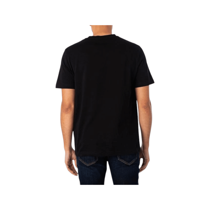 862 80B | The Diesel T-Shirt T-Diegor L6 in Black combines sleek, minimalist design with premium comfort, making it a versatile addition to any wardrobe. Crafted from a high-quality cotton blend, this t-shirt offers a soft, breathable fit that ensures all-day wearability, while the deep black hue provides a bold, timeless look. With a classic crew neck, subtle Diesel branding, and durable construction, this t-shirt delivers effortless style and lasting quality, perfect for pairing with jeans, shorts, or layering with jackets.