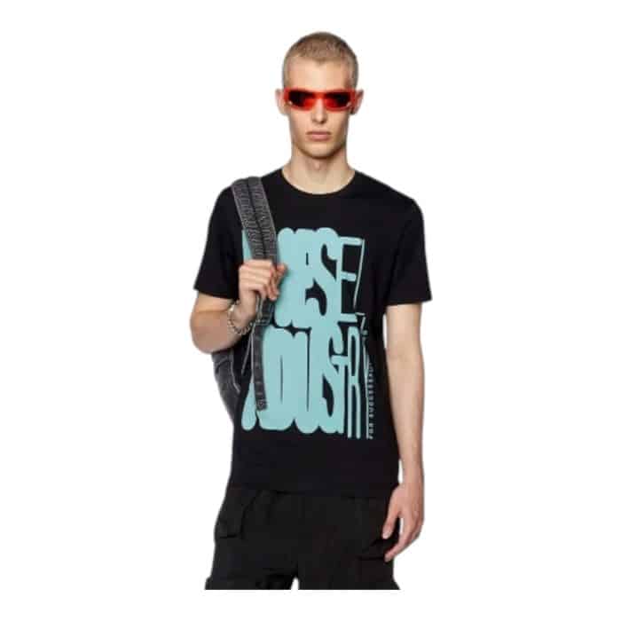 862 84 B | The Diesel T-Shirt T-Diegor K66 Black/Mint blends bold style with everyday comfort, featuring a striking black base accented by vibrant mint details that add a fresh and dynamic touch. Crafted from premium cotton, this t-shirt offers a soft, breathable fit that ensures all-day comfort while maintaining its durability through regular wear. With a classic crew neck, short sleeves, and a subtle Diesel logo on the chest, the T-Diegor K66 is a versatile wardrobe essential that pairs effortlessly with jeans, shorts, or chinos, making it perfect for a variety of casual and smart-casual looks.