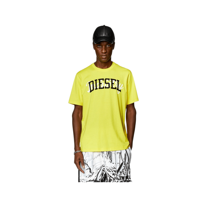 862 85A | The Diesel T-Shirt T-Just N10 Yellow is a timeless wardrobe staple, crafted from soft, breathable cotton to offer exceptional comfort and durability throughout the day. Featuring a classic crew neck and short sleeves, this minimalist t-shirt is subtly branded with the Diesel logo on the chest, making it perfect for both casual and smart-casual looks. Whether paired with jeans for a relaxed vibe or dressed up with tailored trousers, the T-Just N10 Yellow offers versatile styling options, ensuring it becomes a go-to piece in your everyday wardrobe.