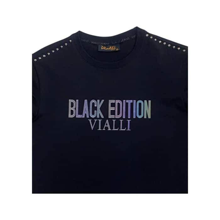 938 23C | The Vialli T-Shirt Edition Black blends timeless style with modern craftsmanship, offering a sleek slim-fit design that enhances your look without compromising comfort. Made from premium cotton, it delivers a soft, breathable feel and resists fading or shrinking, ensuring long-lasting quality even after repeated washes. Its versatile black color and classic crew neckline make it an effortless choice for both casual and semi-formal occasions, adapting seamlessly to any outfit or setting.