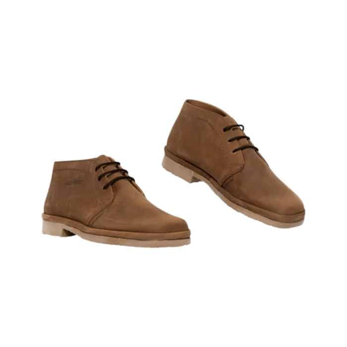 106 17A | The Grasshoppers Nevada Dark Brown Sandiego combines timeless style and everyday practicality with its rich synthetic leather upper, detailed stitching, and versatile dark brown hue. Designed for comfort, it features a padded collar, cushioned insole, and breathable lining, ensuring long-lasting support and a cool, dry feel throughout the day. With a lightweight yet durable rubber outsole that provides excellent grip and stability, this shoe is perfect for casual outings, work, or weekend adventures.