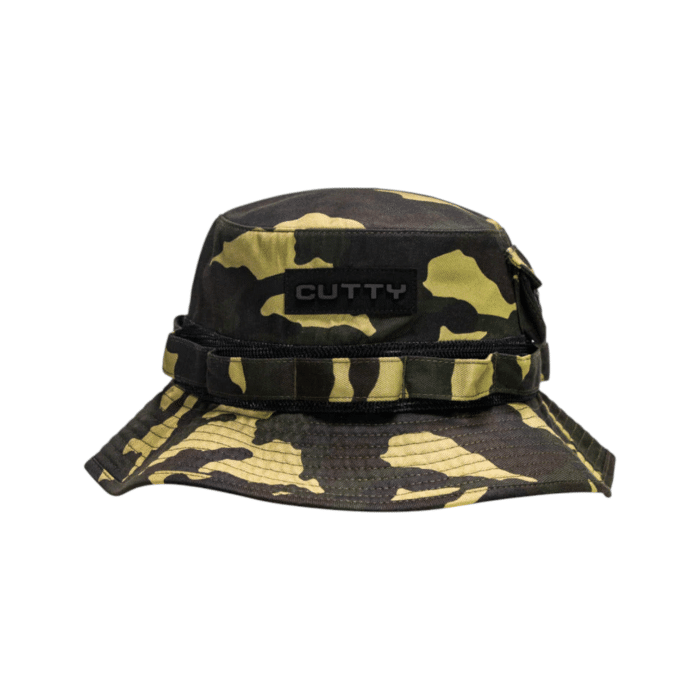 12 17A | The Cutty Bucket Hats Egan in camouflage combines bold style with practical utility, featuring a durable design that offers excellent sun protection while making a standout statement. Perfect for outdoor adventures, casual outings, or adding an edge to your streetwear, this versatile hat ensures comfort and style wherever you go.