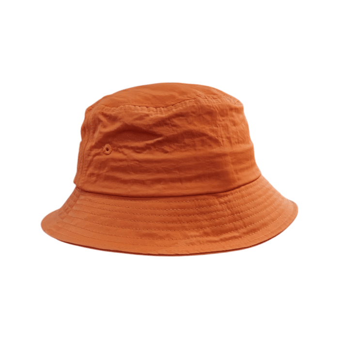 12 2A | Elevate your style with the Cutty Floppy Jax bucket hat in classic orange, featuring sleek raised lettering for a bold look. Perfect for versatile wear, it combines premium comfort with timeless design.