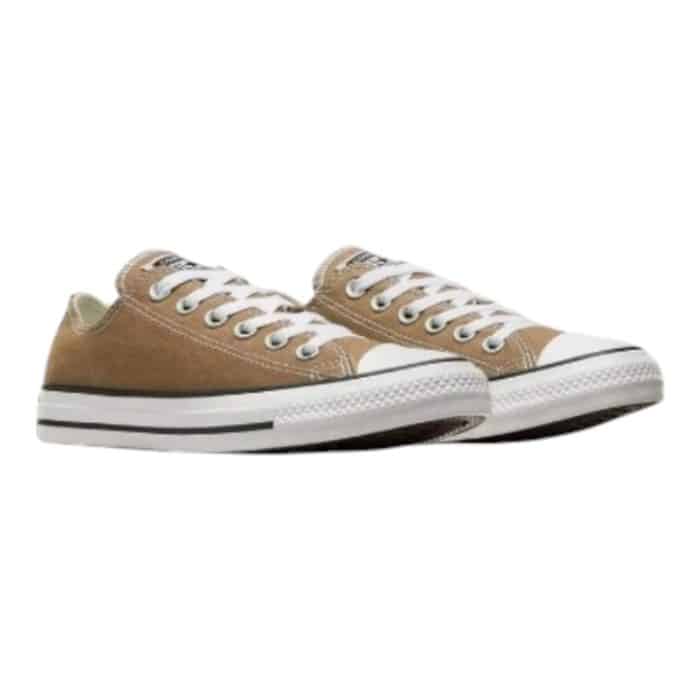 126 54 B | The Converse Chuck Taylor All Star OX Desert Dust combines timeless design with a modern, earthy twist, featuring a muted beige canvas upper that effortlessly complements any outfit. Its durable construction, including a vulcanized rubber outsole and reinforced stitching, ensures lasting comfort and reliability for daily wear. Subtle branding and the iconic rubber toe cap complete the look, making this low-top sneaker a versatile and stylish choice for any occasion.